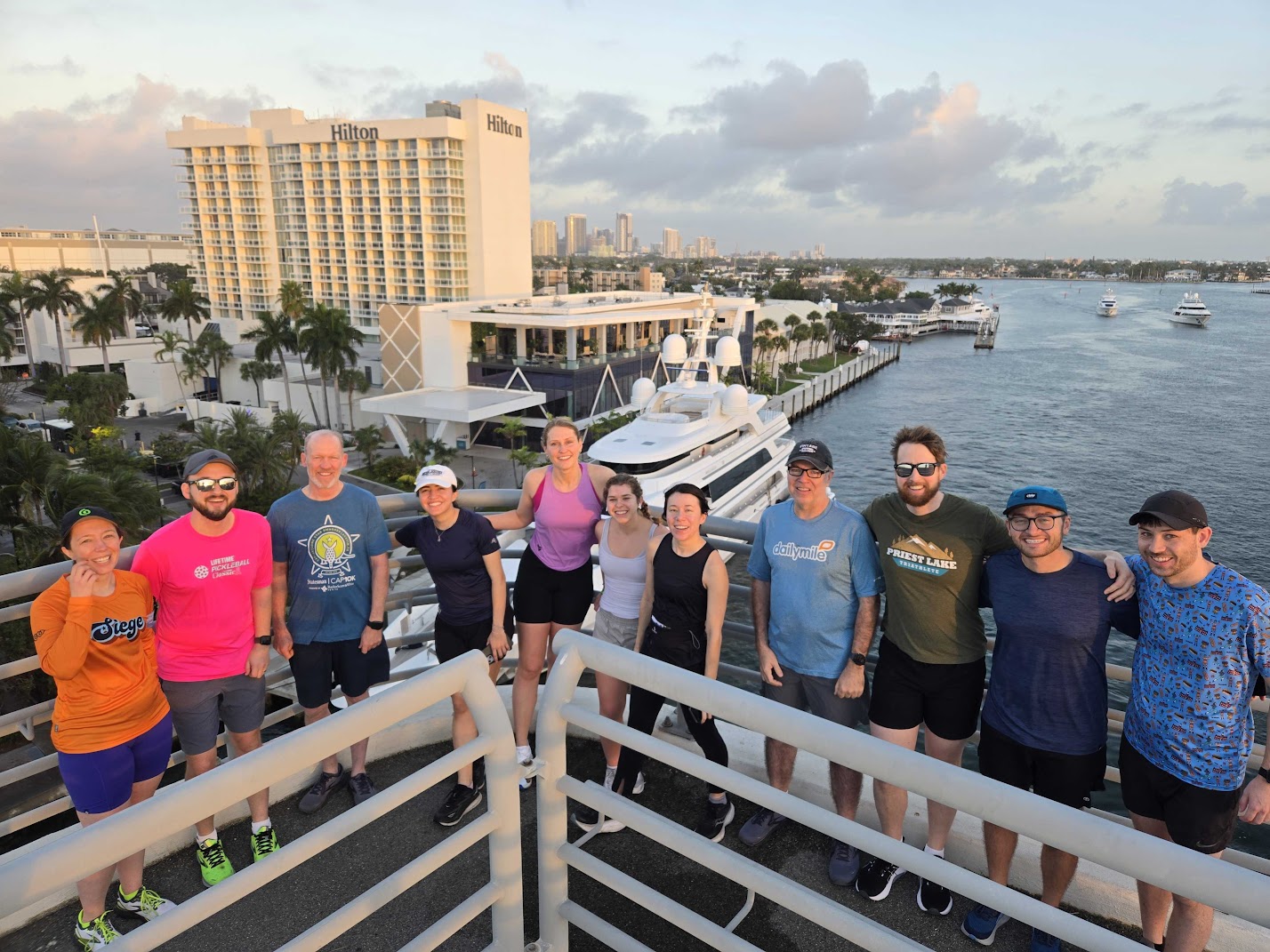 group of runners on a bridge