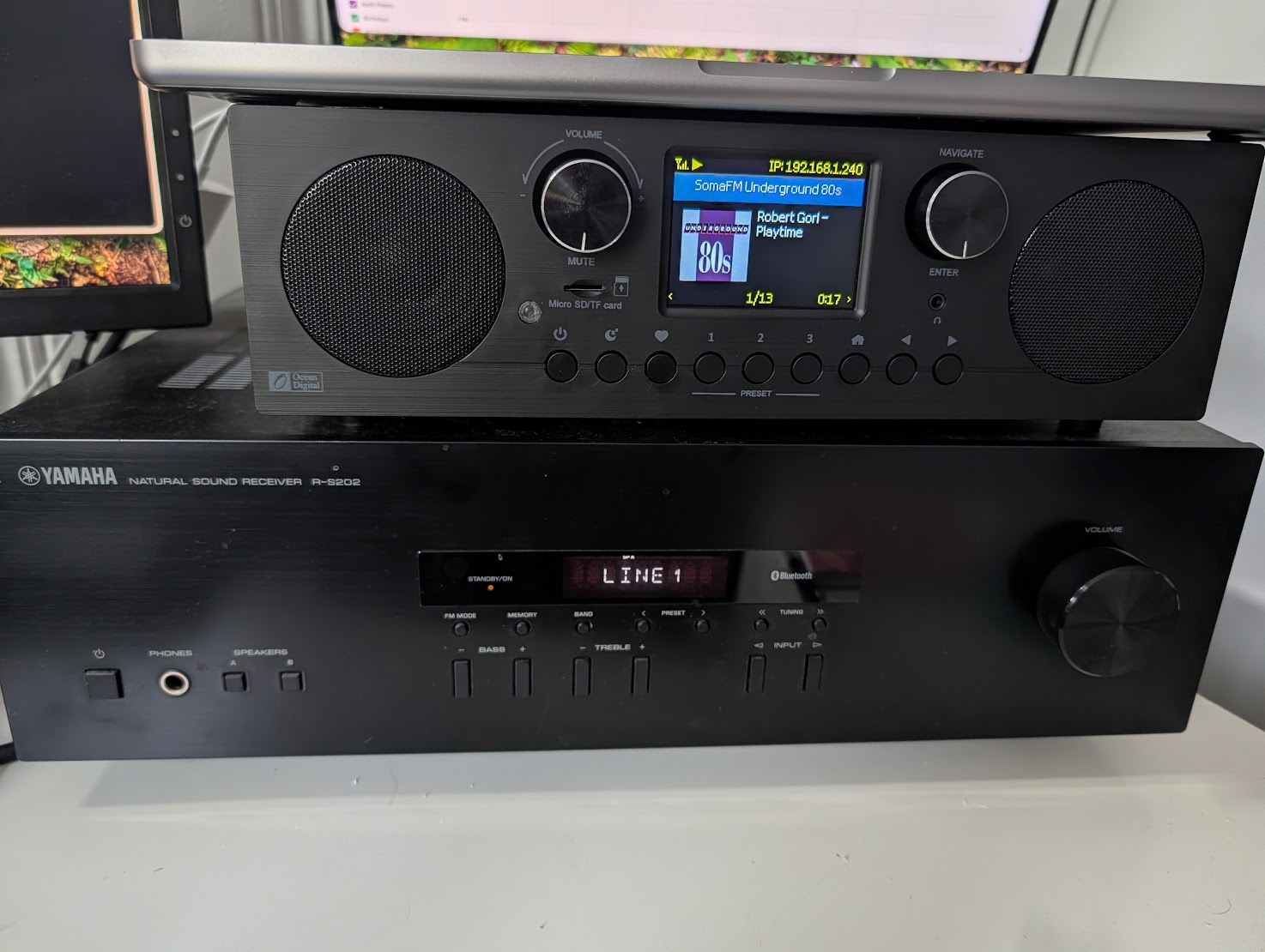 yamaha R-S202 receiver with an internet radio sitting on top of it