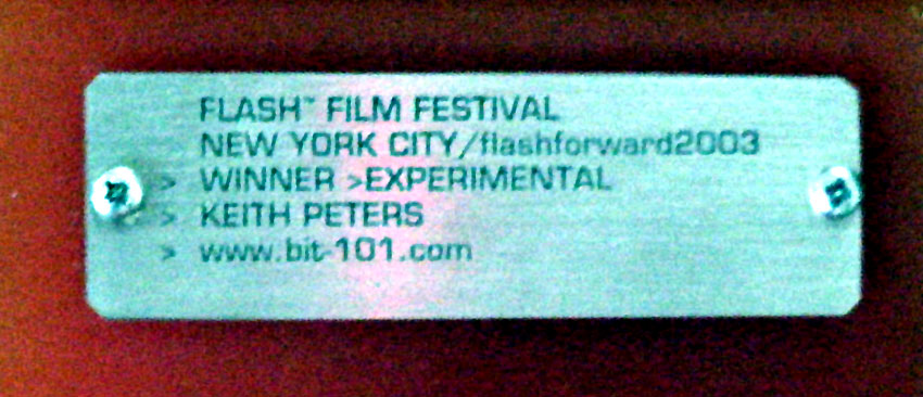 plaque on trophy: flash film festival. new york city FlashForward 2003. winner > experimental. keith peters. www.bit-101.com